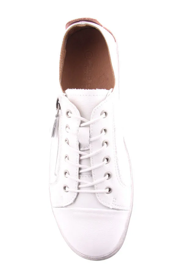 METTY WHITE